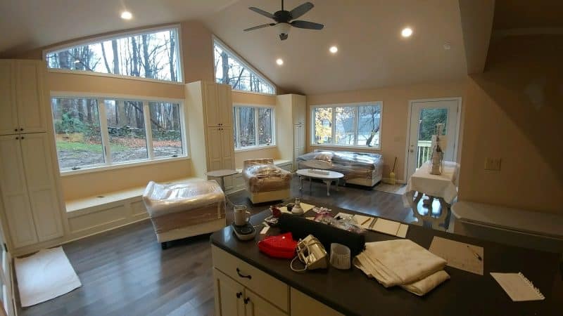 Energy efficient window installation allows incredible natural light into this large open living space