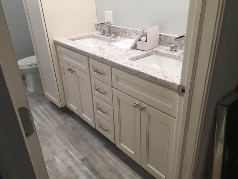 Bathroom remodel - vanity installation with his and hers sinks 